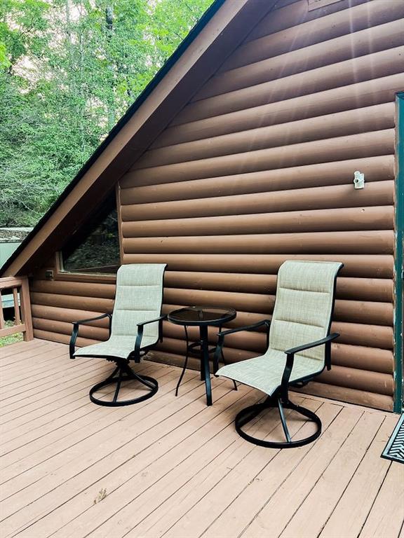 893 Hooper Road Cleveland, GA 30528 - Photo 42 of 68 a view of a chairs in a patio