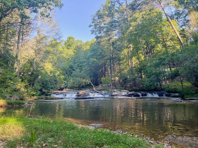 893 Hooper Road Cleveland, GA 30528 - Photo 49 of 68 a view of a lake with a house in the background