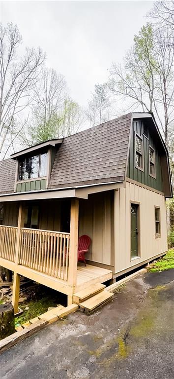 893 Hooper Road Cleveland, GA 30528 - Photo 51 of 68 a front view of a house with parking space