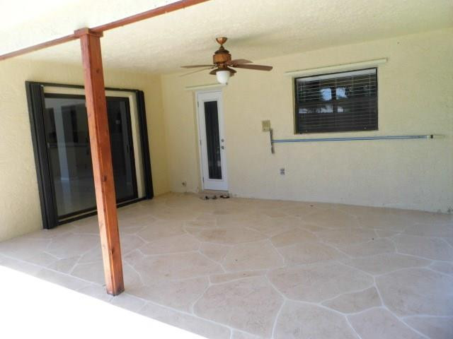 610 Southwest 17th Street Boca Raton, FL 33486 - Photo 22 of 49 a view of a livingroom with a ceiling fan and window