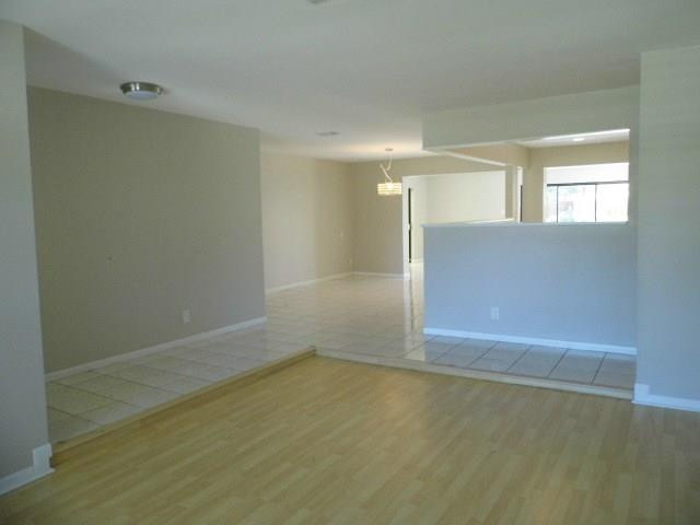 610 Southwest 17th Street Boca Raton, FL 33486 - Photo 6 of 49 an empty room with windows
