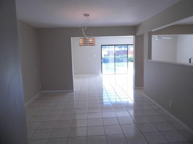 610 Southwest 17th Street Boca Raton, FL 33486 - Photo 9 of 49 a view of an empty room and window