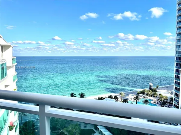 a view of an ocean from a balcony