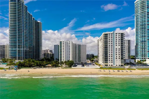 a view of a city with tall buildings