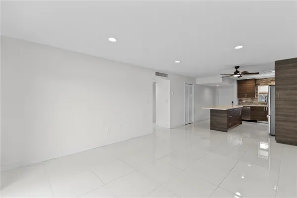 a view of a kitchen with a sink