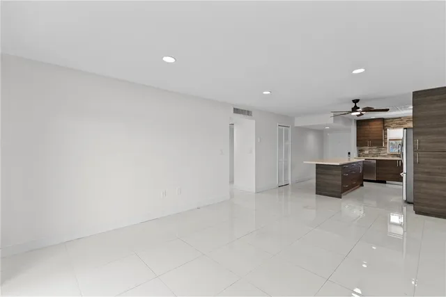 a view of a kitchen with a sink