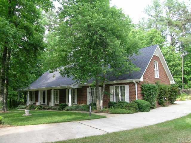 9408 Does Run Court Raleigh, NC 27613 - Photo 1 of 1 a front view of a house with a yard