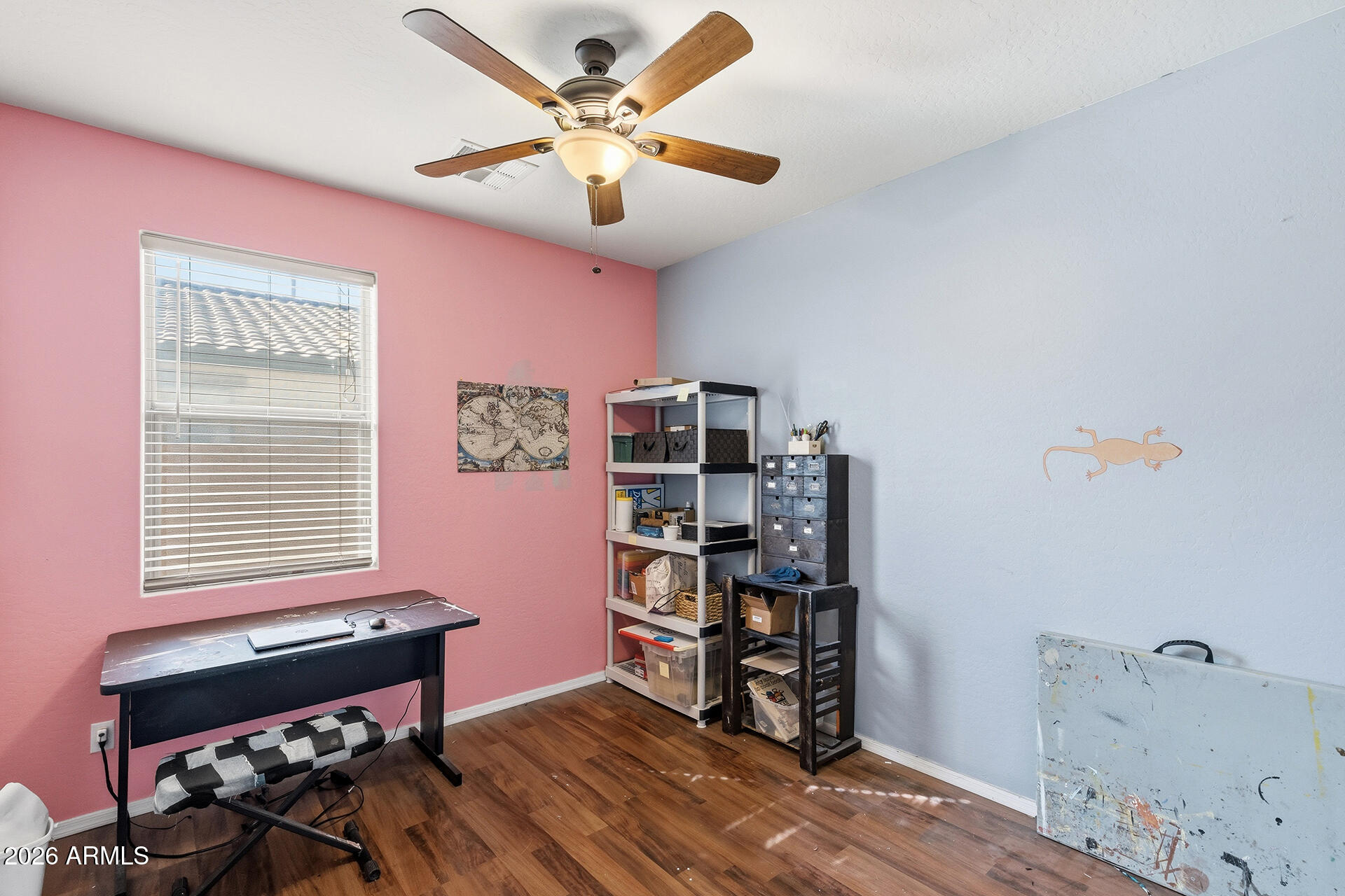 6718 West Darrel Road Laveen, AZ 85339 - Photo 14 of 49 a bedroom with furniture and a window