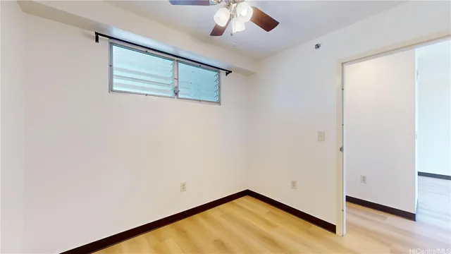 a view of a room with a large window