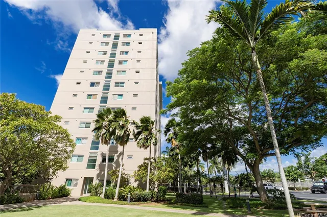 a view of a tall white building