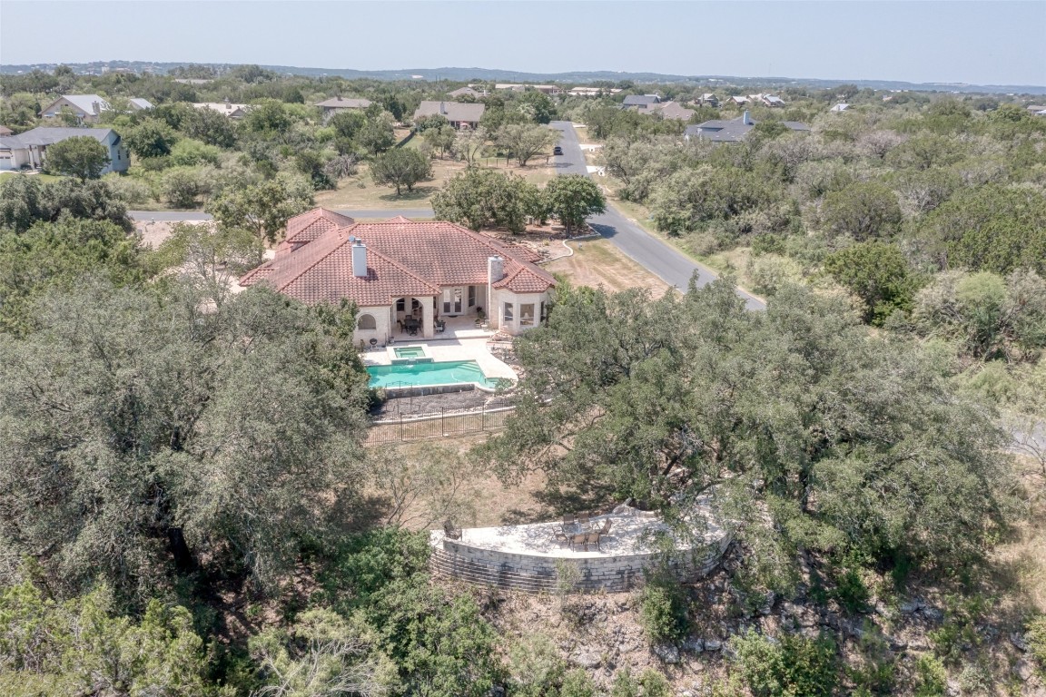 1001 Wesley Ridge Drive Spicewood, TX 78669 - Photo 30 of 35 Back of the house is a separate stone deck with views