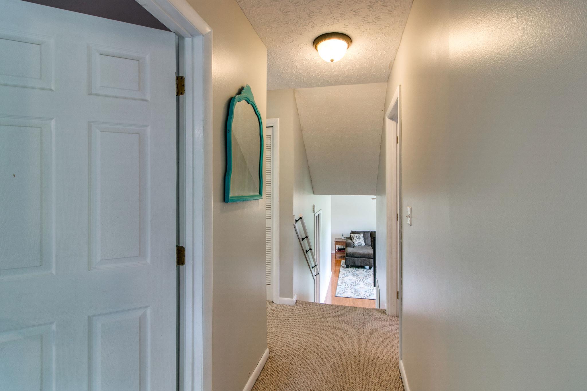 330 Cooley Ford Road Tennessee Ridge, TN 37178 - Photo 11 of 29 a view of a bathroom from a hallway