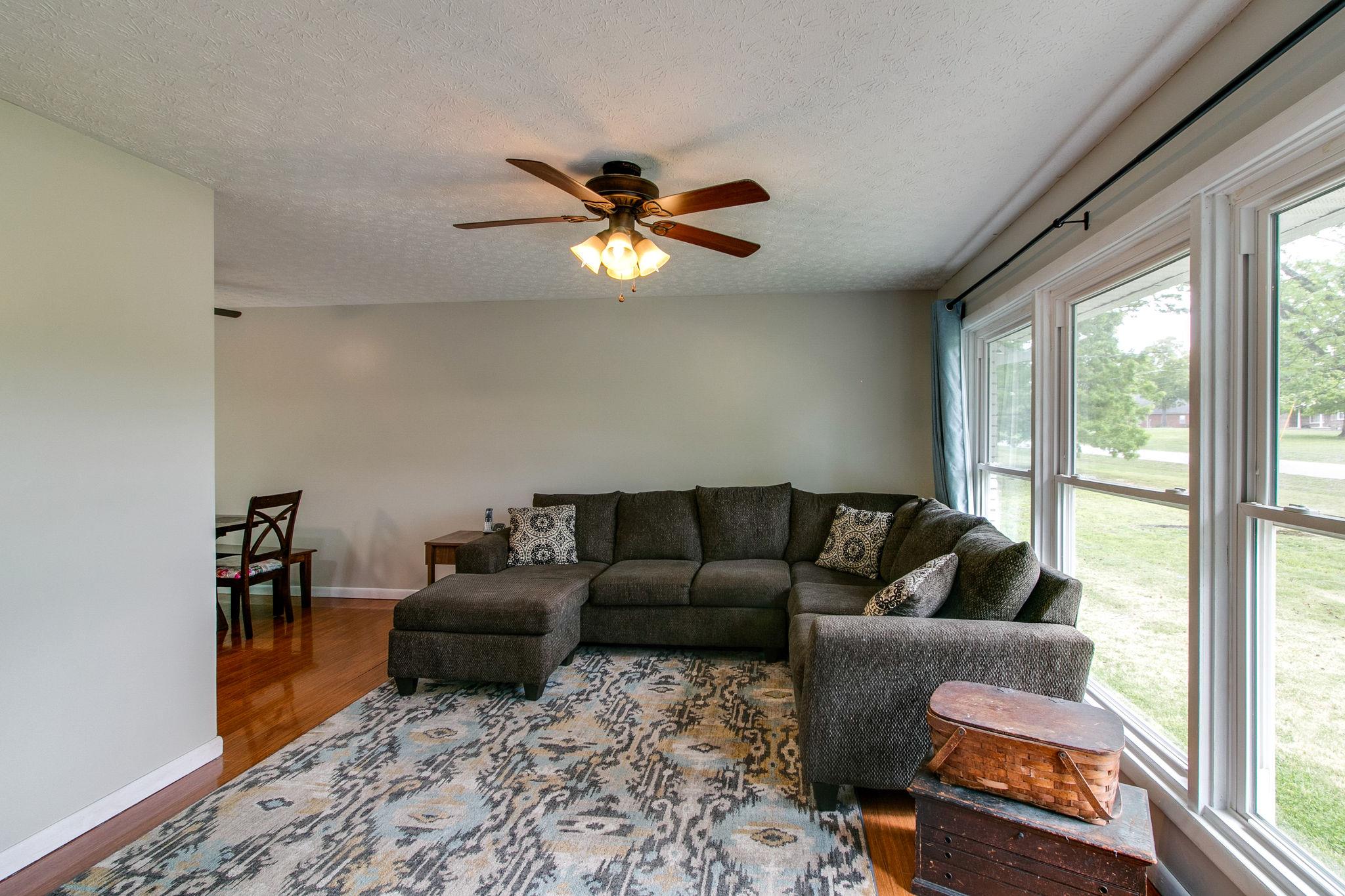 330 Cooley Ford Road Tennessee Ridge, TN 37178 - Photo 5 of 29 a living room with furniture and a window