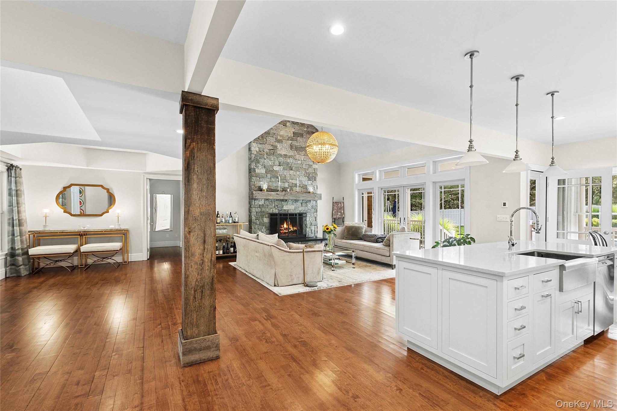 3470 North Bayview Road Southold, NY 11971 - Photo 25 of 25 Kitchen with an island with sink, open floor plan, light wood finished floors
