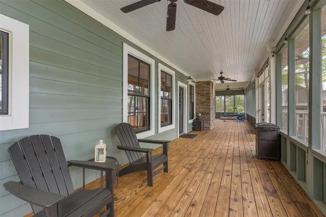 a view of two chairs in the balcony