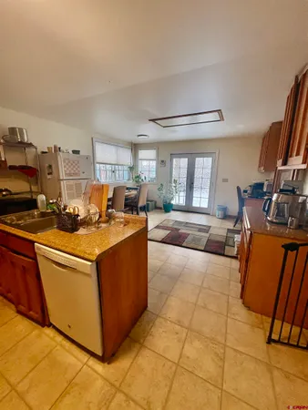 a view of house with yard