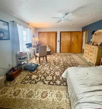 a view of a backyard of the house