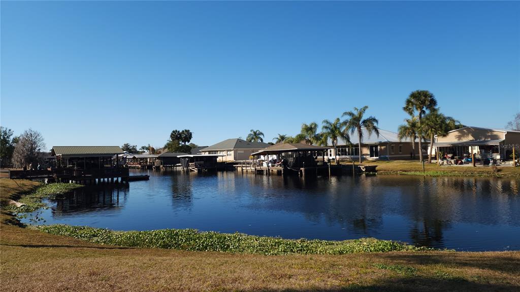 1620 River Road Astor, FL 32102 - Photo 1 of 1 a swimming pool view with a lake view