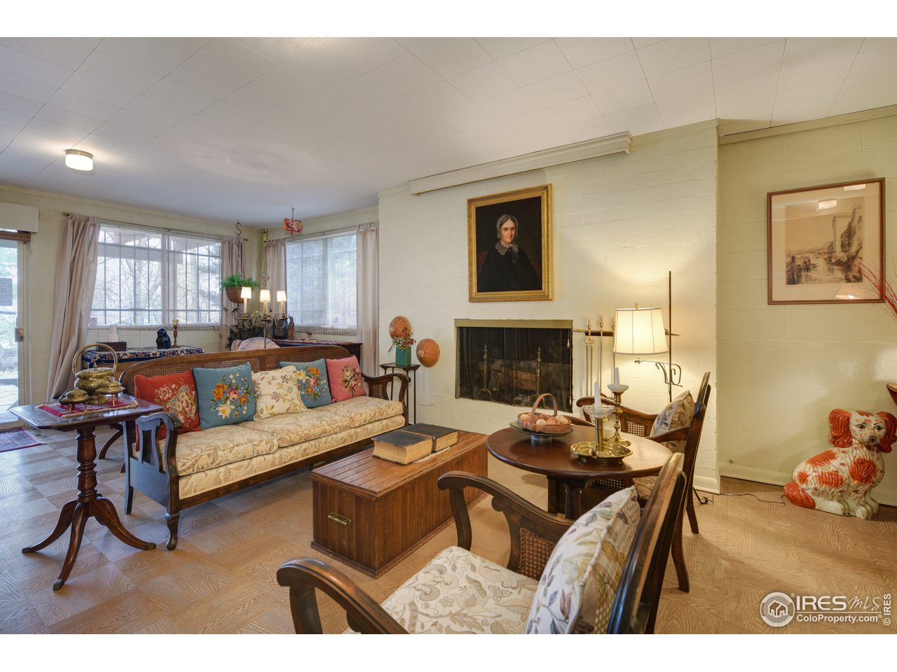 550 13th Street Boulder, CO 80302 - Photo 14 of 26 a living room with furniture and a fireplace