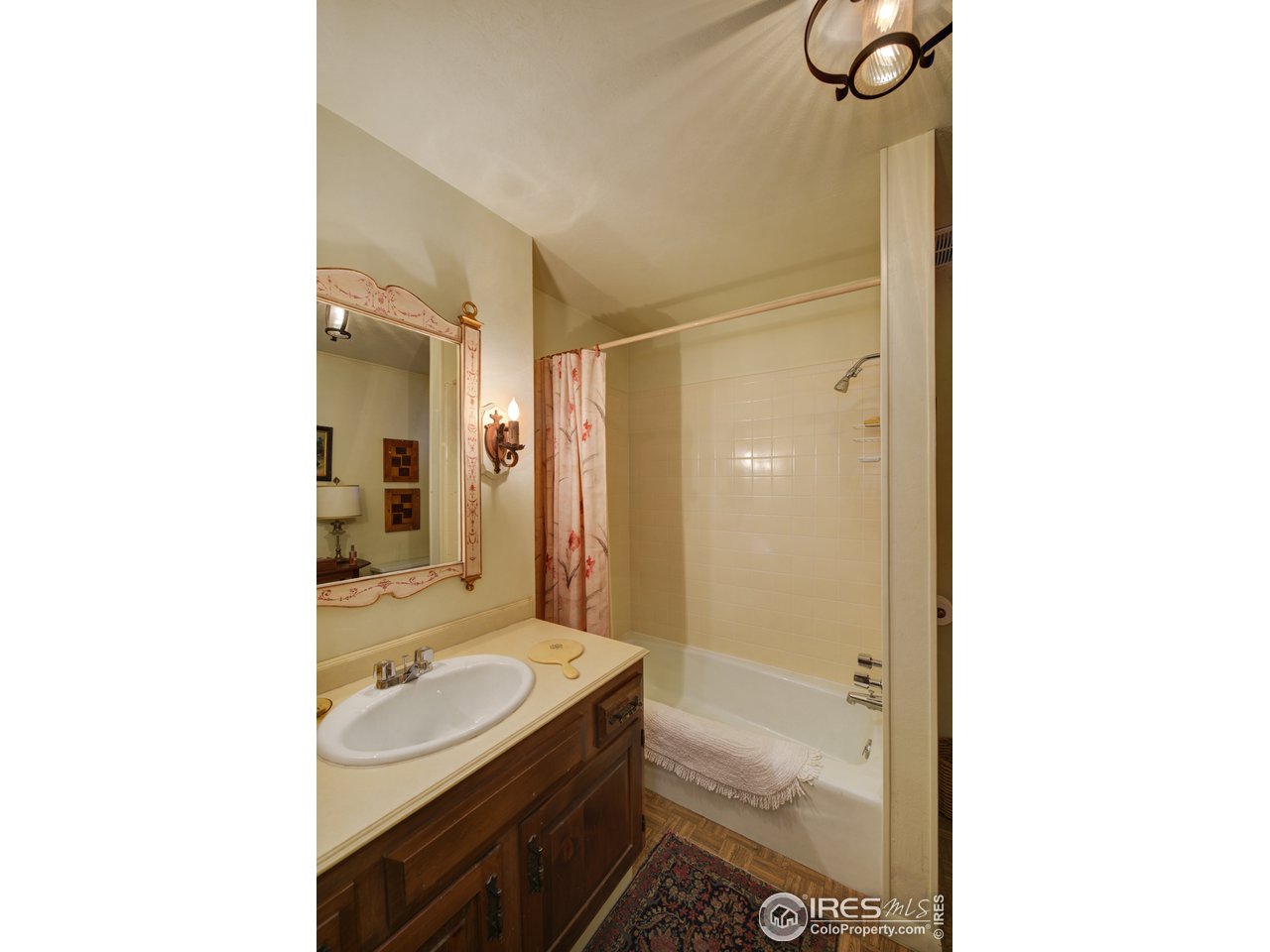 550 13th Street Boulder, CO 80302 - Photo 15 of 26 a bathroom with a sink and a mirror