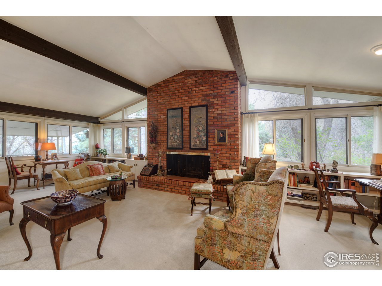 550 13th Street Boulder, CO 80302 - Photo 3 of 26 a living room with furniture and a large window