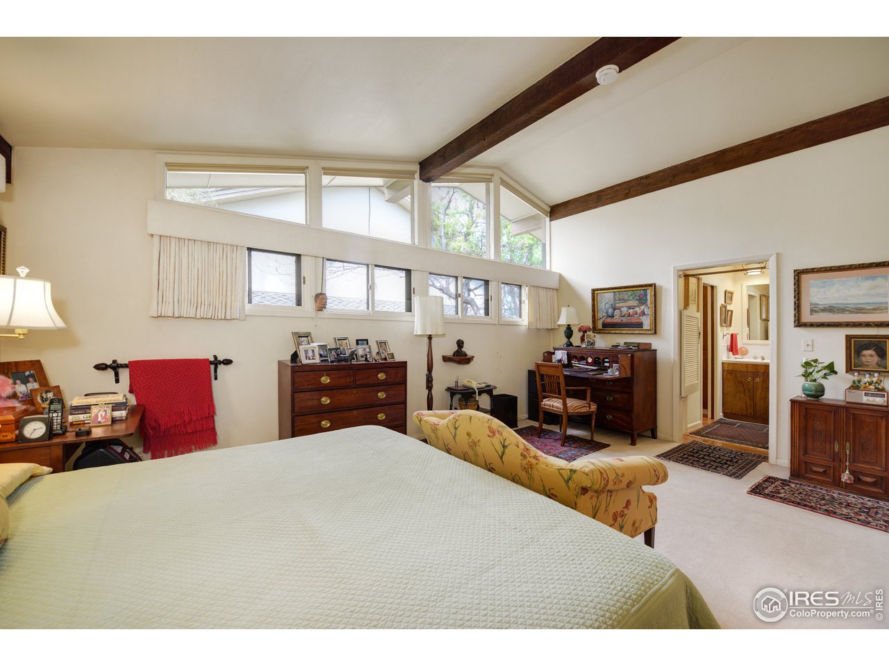 550 13th Street Boulder, CO 80302 - Photo 10 of 26 a bed room with furniture and a large window