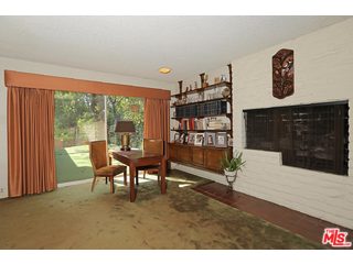 12251 Castlegate Drive Los Angeles, CA 90049 - Photo 17 of 38 a view of a livingroom with furniture