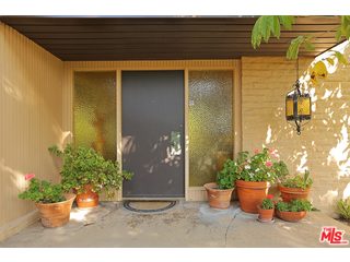 12251 Castlegate Drive Los Angeles, CA 90049 - Photo 4 of 38 a view of a door of the house