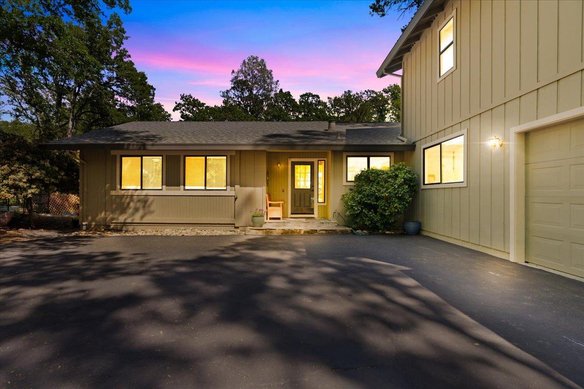 23155 Foothill Road Auburn, CA 95602 - Photo 1 of 1 a view of a house with a yard