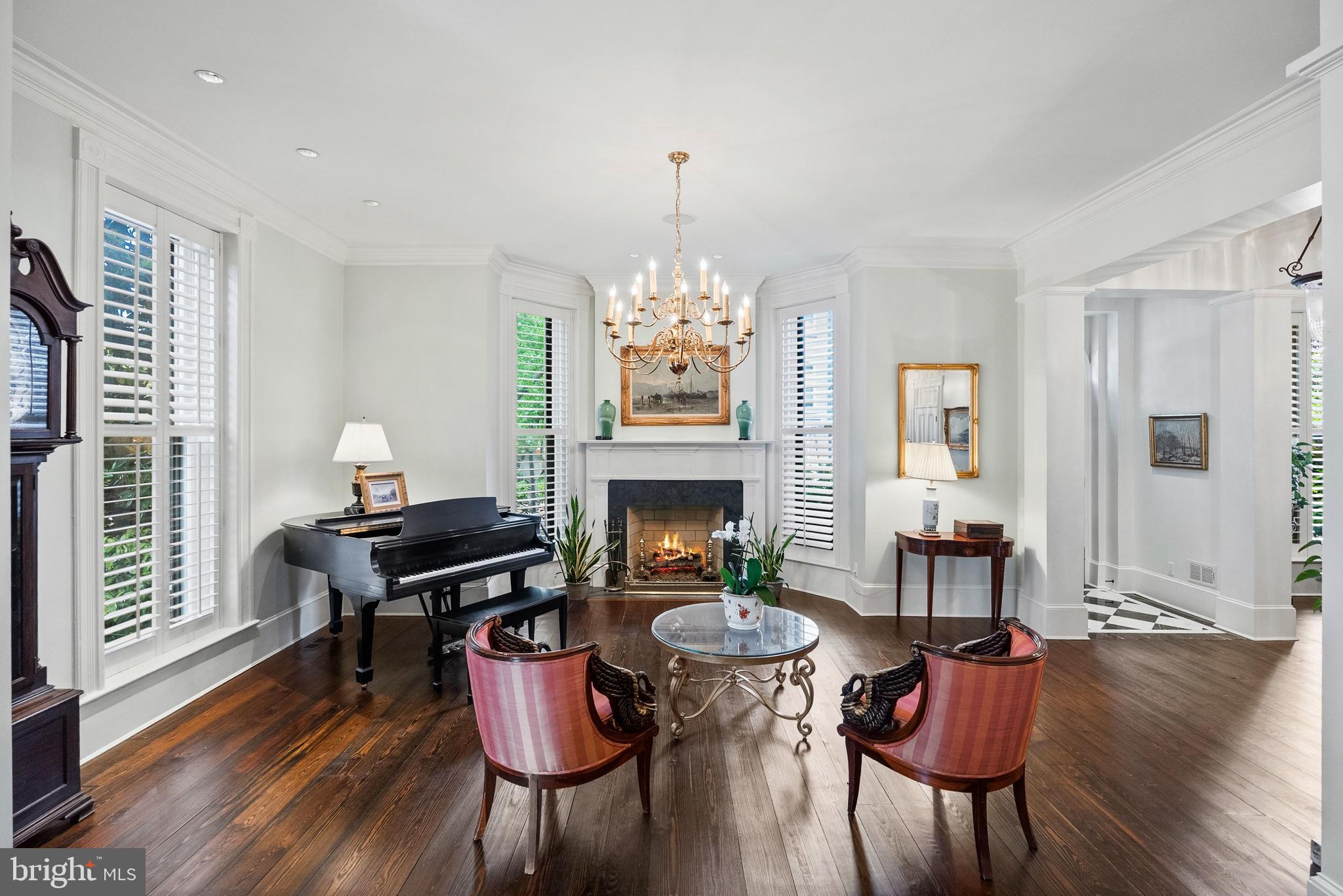 1601 28th Street Northwest Washington, DC 20007 - Photo 13 of 29 a living room with furniture and a fireplace