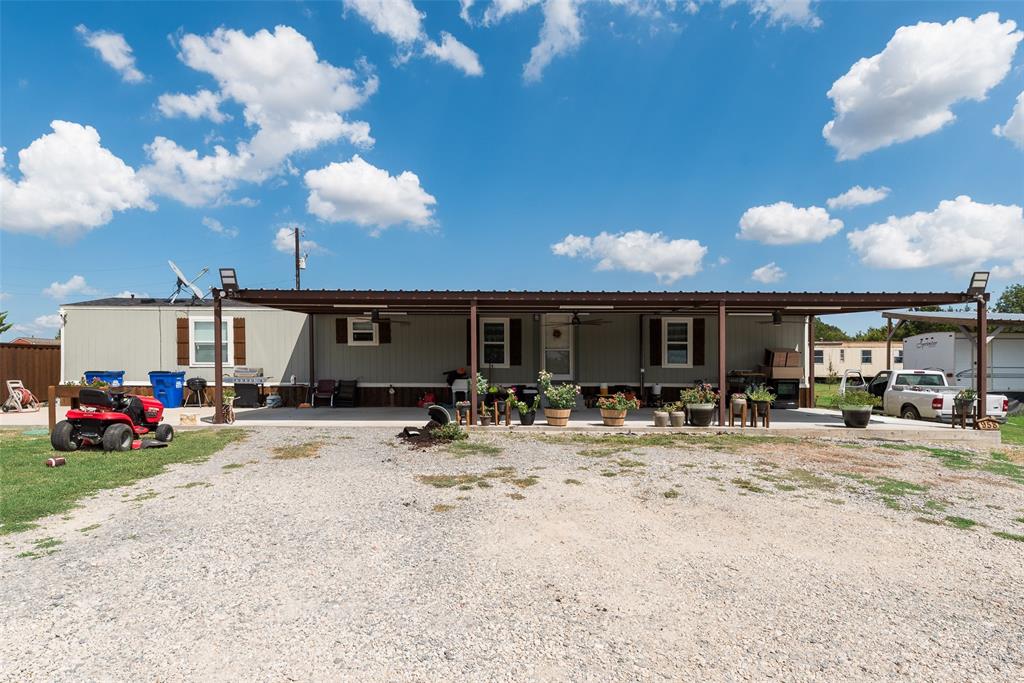 958 Watkins Road Sherman, TX 75090 - Photo 18 of 23 Expansive gravel driveway providing ample parking