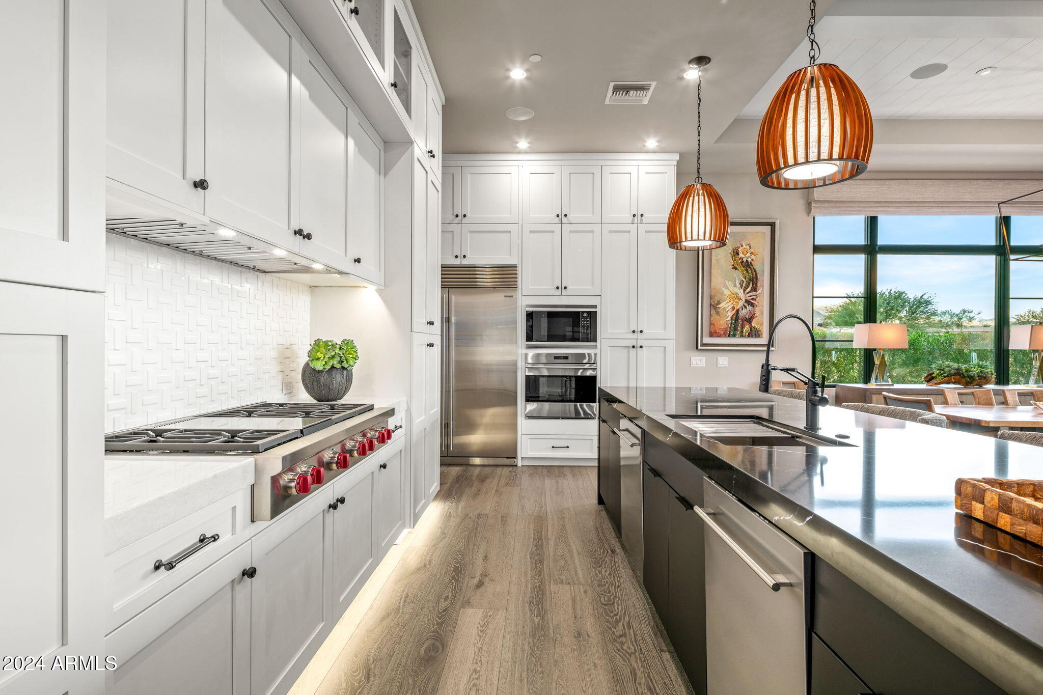 37200 North Cave Creek Road, Unit 1082 Scottsdale, AZ 85262 - Photo 22 of 66 a kitchen with stainless steel appliances granite countertop a stove a sink and a refrigerator