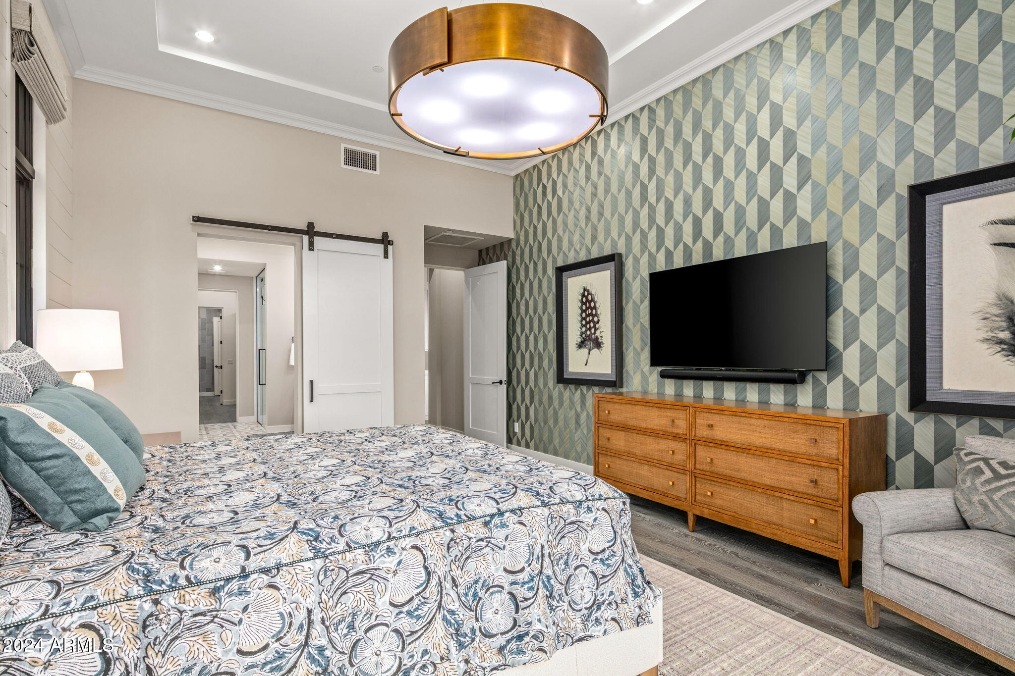 37200 North Cave Creek Road, Unit 1082 Scottsdale, AZ 85262 - Photo 29 of 66 a bedroom with a bed and a flat screen tv