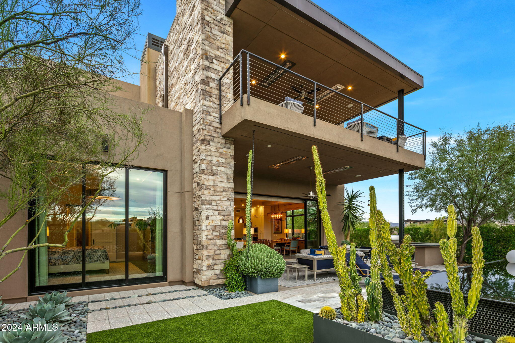 37200 North Cave Creek Road, Unit 1082 Scottsdale, AZ 85262 - Photo 63 of 66 a view of a chair and tables in the patio