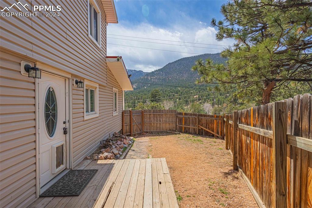 8228 Highway 24 Cascade, CO 80809 - Photo 19 of 36 a view of a wooden balcony with wooden floor
