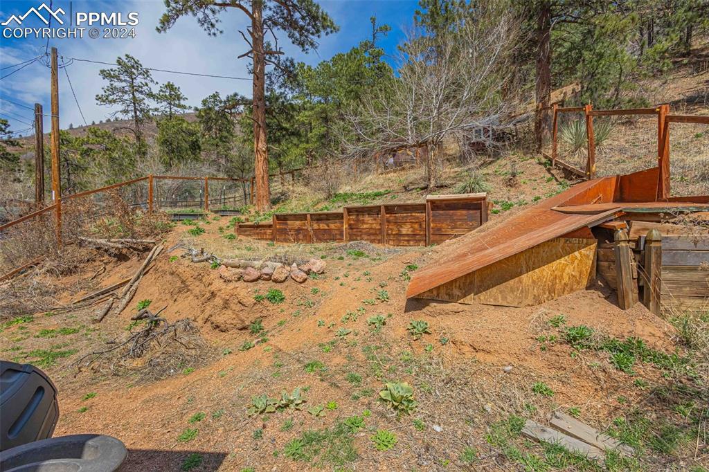 8228 Highway 24 Cascade, CO 80809 - Photo 22 of 36 a view of a balcony with a yard