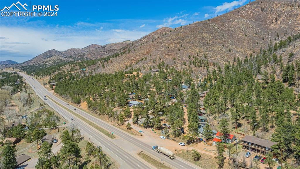 8228 Highway 24 Cascade, CO 80809 - Photo 33 of 36 a view of a mountain from a balcony