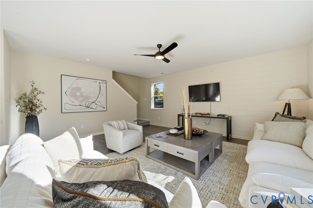 6338 Sterling Way Ruther Glen, VA 22546 - Photo 14 of 47 a living room with furniture and a flat screen tv