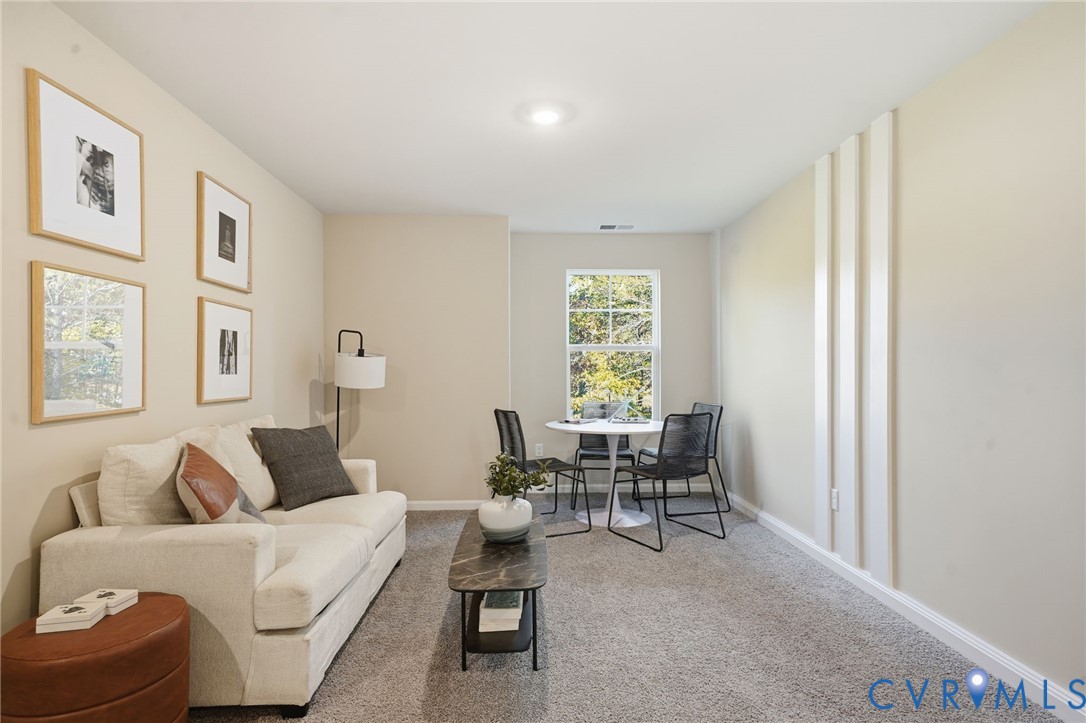 6338 Sterling Way Ruther Glen, VA 22546 - Photo 20 of 47 a living room with furniture and a window