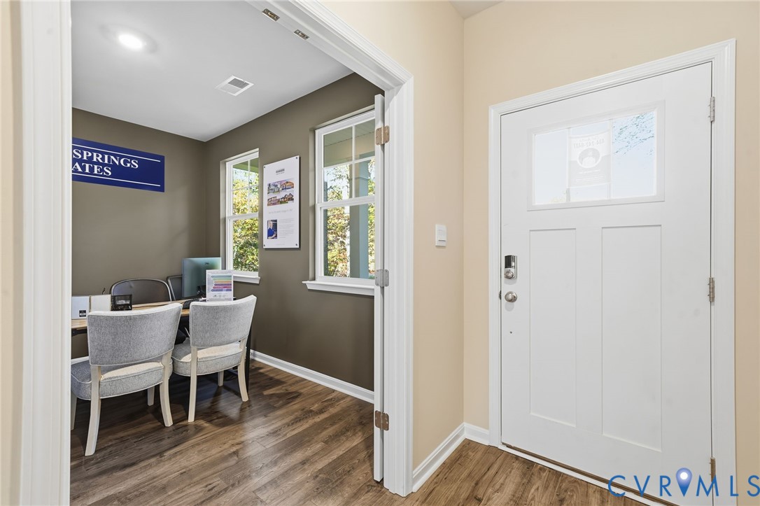 6338 Sterling Way Ruther Glen, VA 22546 - Photo 2 of 47 a view of a dining room with furniture window and wooden floor