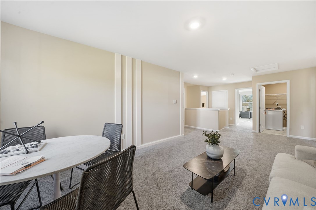6338 Sterling Way Ruther Glen, VA 22546 - Photo 21 of 47 a living room with furniture and wooden floor