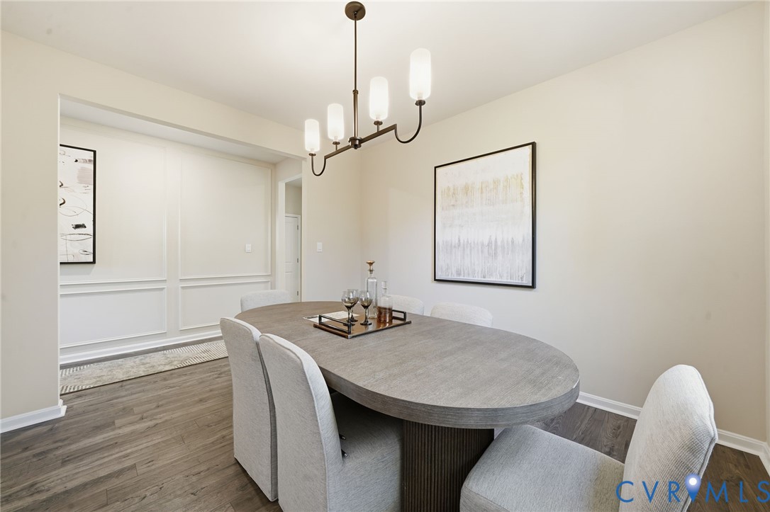 6338 Sterling Way Ruther Glen, VA 22546 - Photo 25 of 47 a dining room with furniture and wooden floor