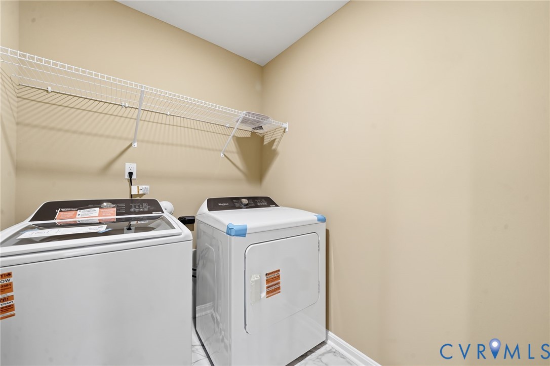 6338 Sterling Way Ruther Glen, VA 22546 - Photo 45 of 47 a utility room with dryer and washer