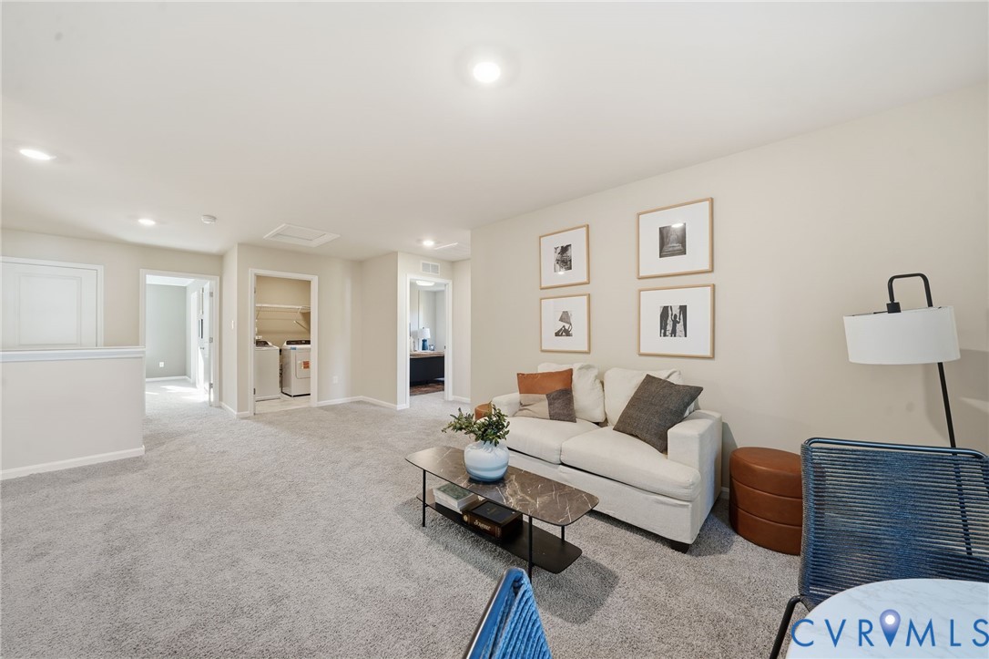 6338 Sterling Way Ruther Glen, VA 22546 - Photo 46 of 47 a living room with furniture and a couch