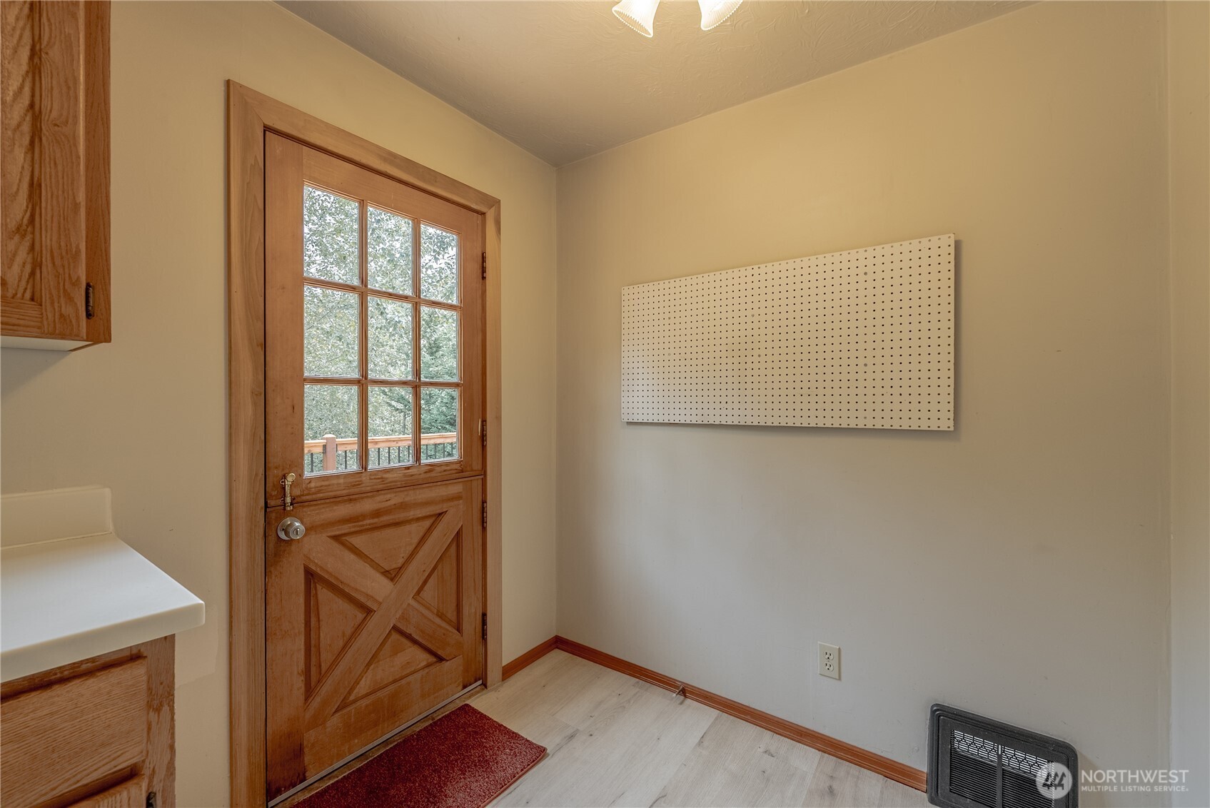 20006 68th Avenue Northeast Kenmore, WA 98028 - Photo 17 of 40 a view of front door with wooden floor