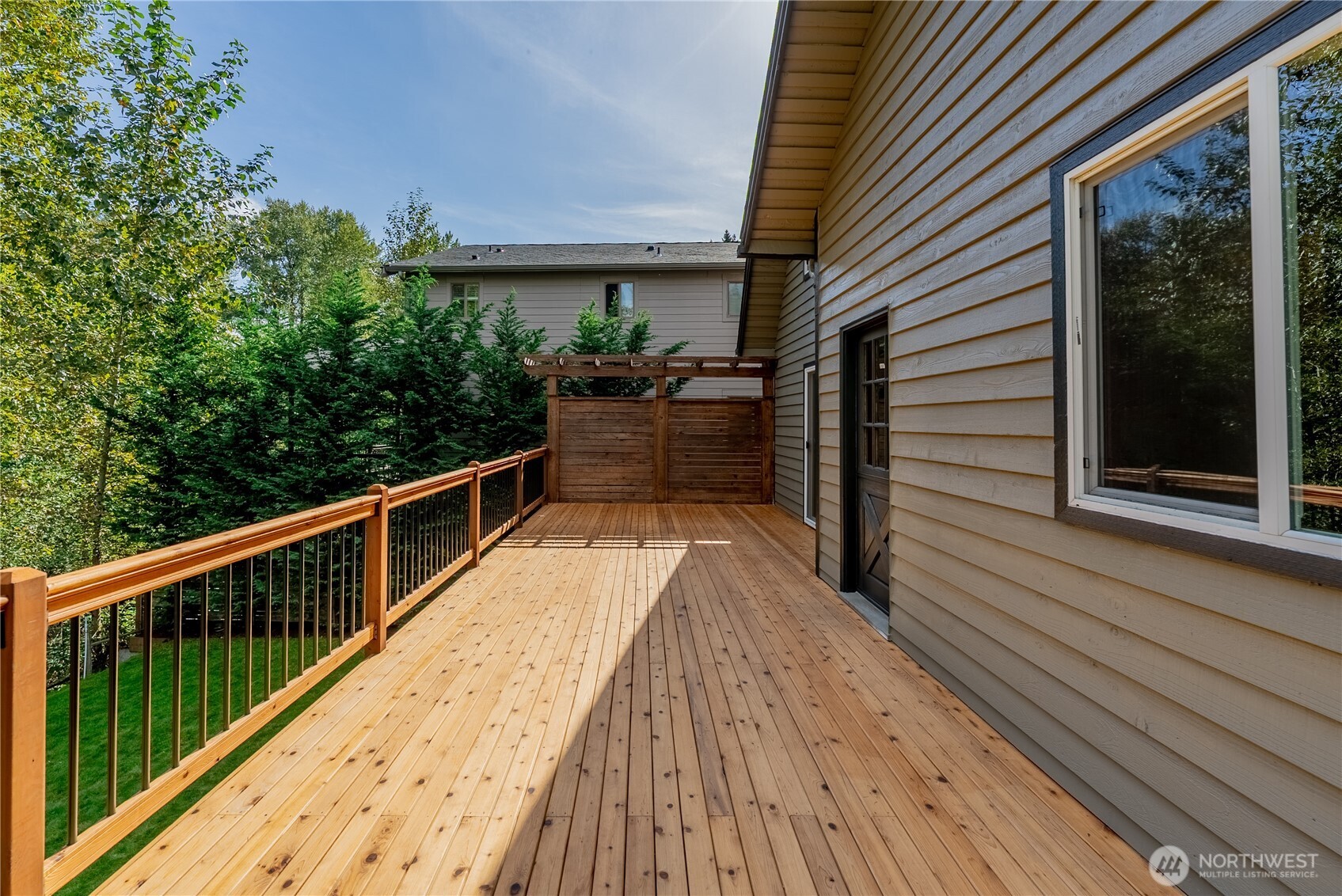 20006 68th Avenue Northeast Kenmore, WA 98028 - Photo 19 of 40 a view of balcony with wooden floor and seating space