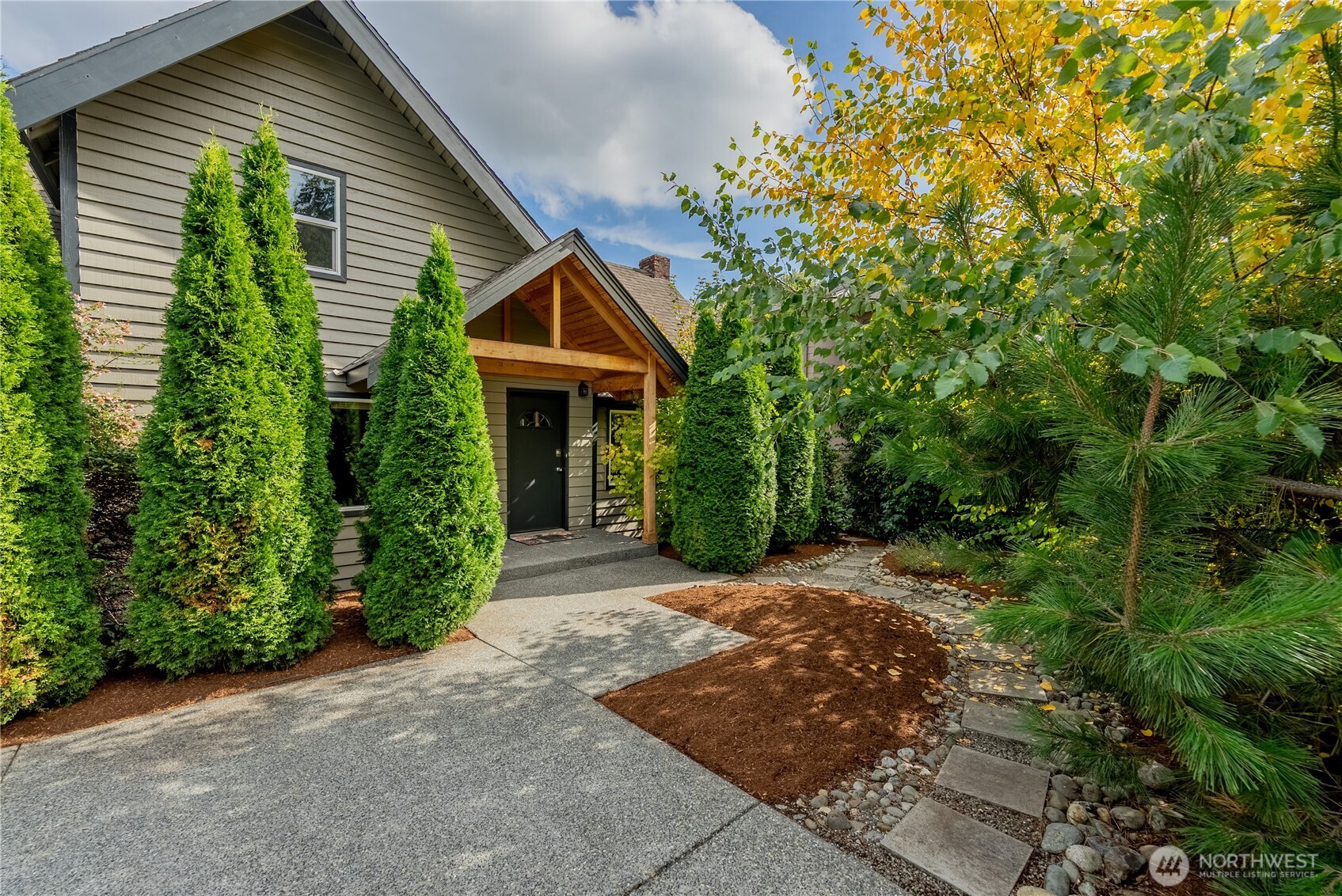 20006 68th Avenue Northeast Kenmore, WA 98028 - Photo 2 of 40 a front view of a house with a yard