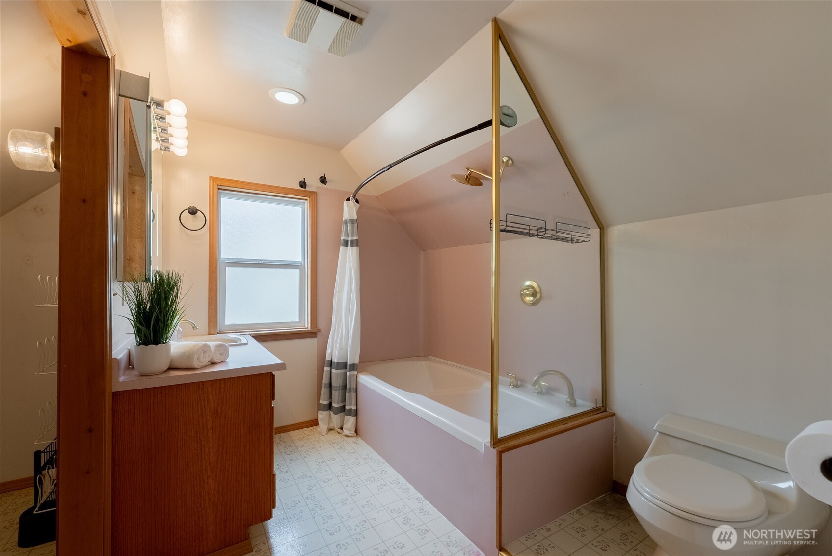 20006 68th Avenue Northeast Kenmore, WA 98028 - Photo 28 of 40 a bathroom with a granite countertop bathtub shower sink vanity and toilet
