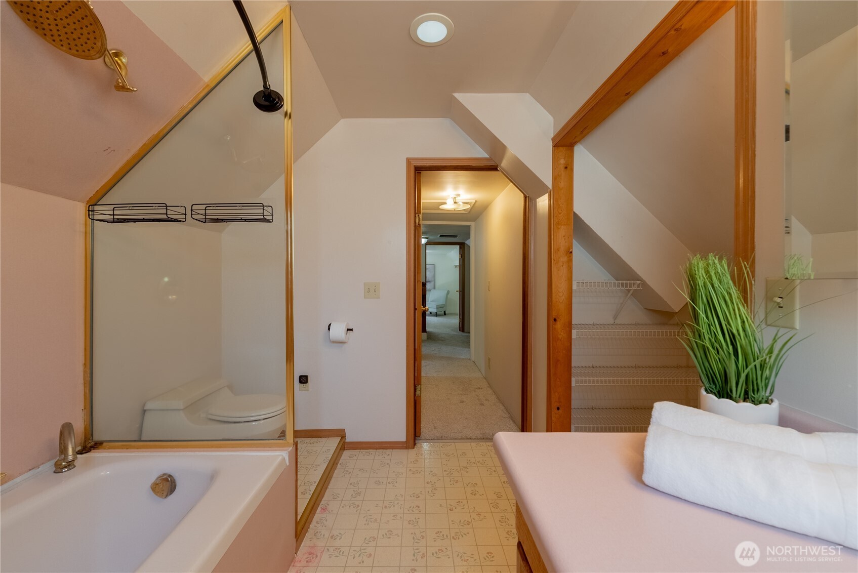 20006 68th Avenue Northeast Kenmore, WA 98028 - Photo 30 of 40 a bathroom with a tub a mirror and a shower