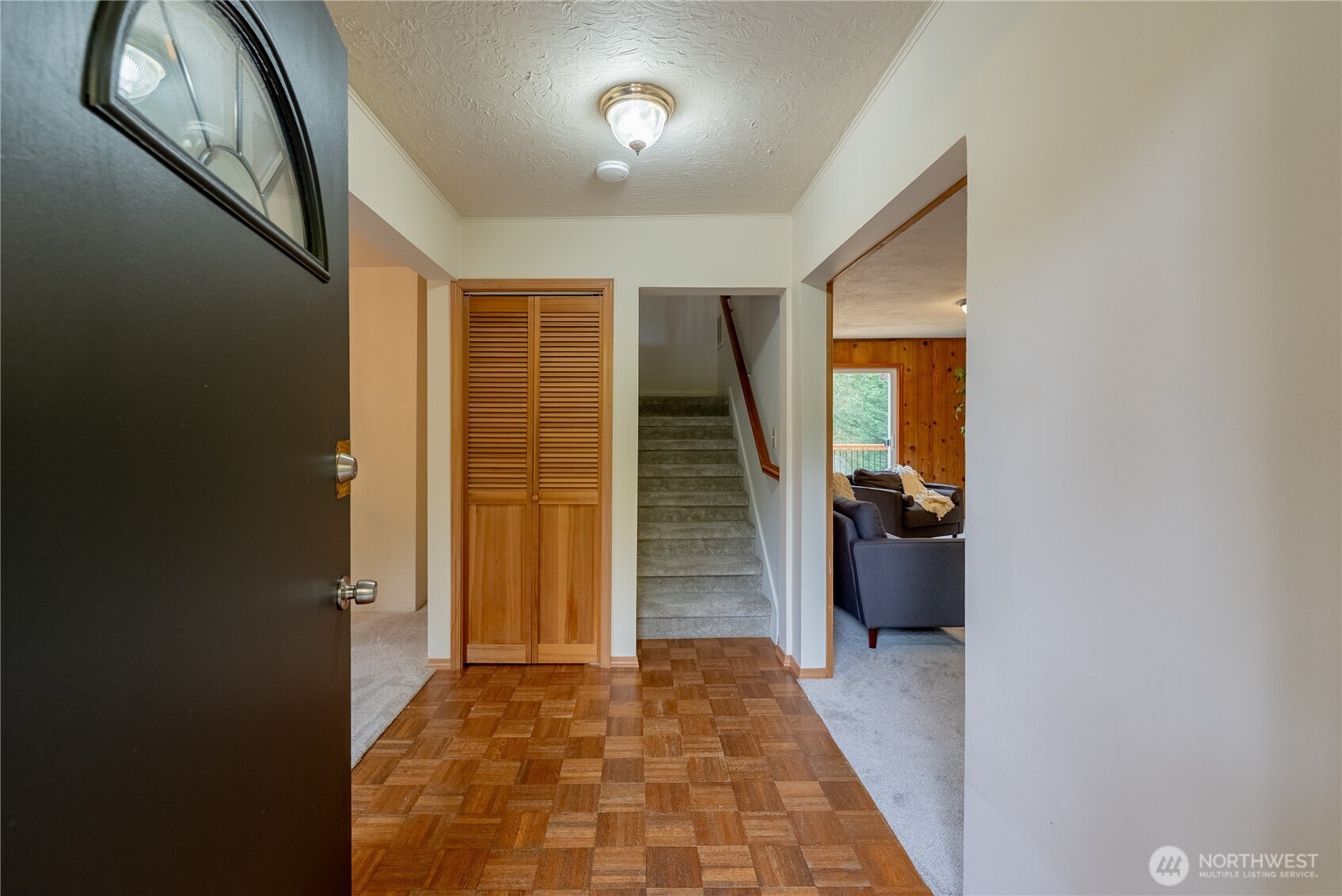 20006 68th Avenue Northeast Kenmore, WA 98028 - Photo 6 of 40 a view of hallway with livingroom and stairs